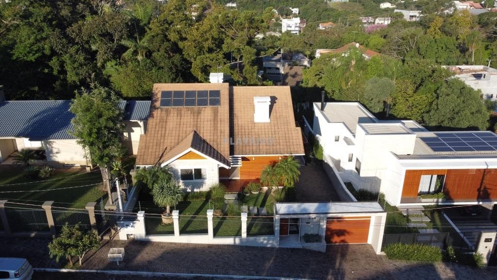 CASA COM 3 DORMITÓRIOS, 3 VAGAS, 320M² ÁREA PRIVATIVA À VENDA EM VINTE E CINCO DE JULHO - Imagem 2