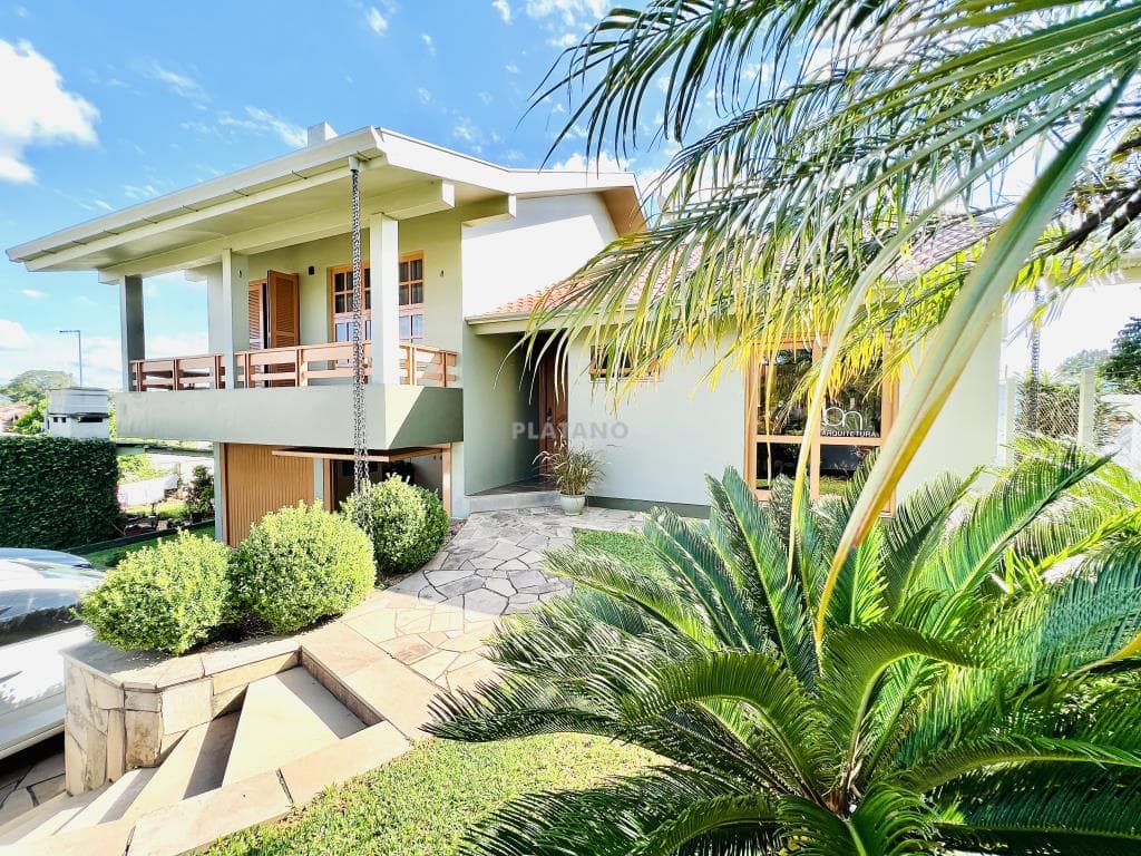 CASA COM 3 DORMITÓRIOS, 2 VAGAS, 220M² ÁREA PRIVATIVA para venda EM VINTE E CINCO DE JULHO - foto 1