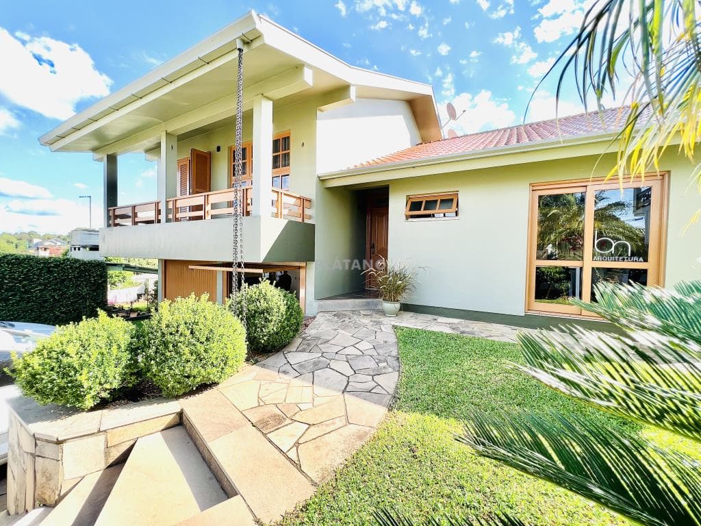 CASA COM 3 DORMITÓRIOS, 2 VAGAS, 220M² ÁREA PRIVATIVA para venda EM VINTE E CINCO DE JULHO - foto 2