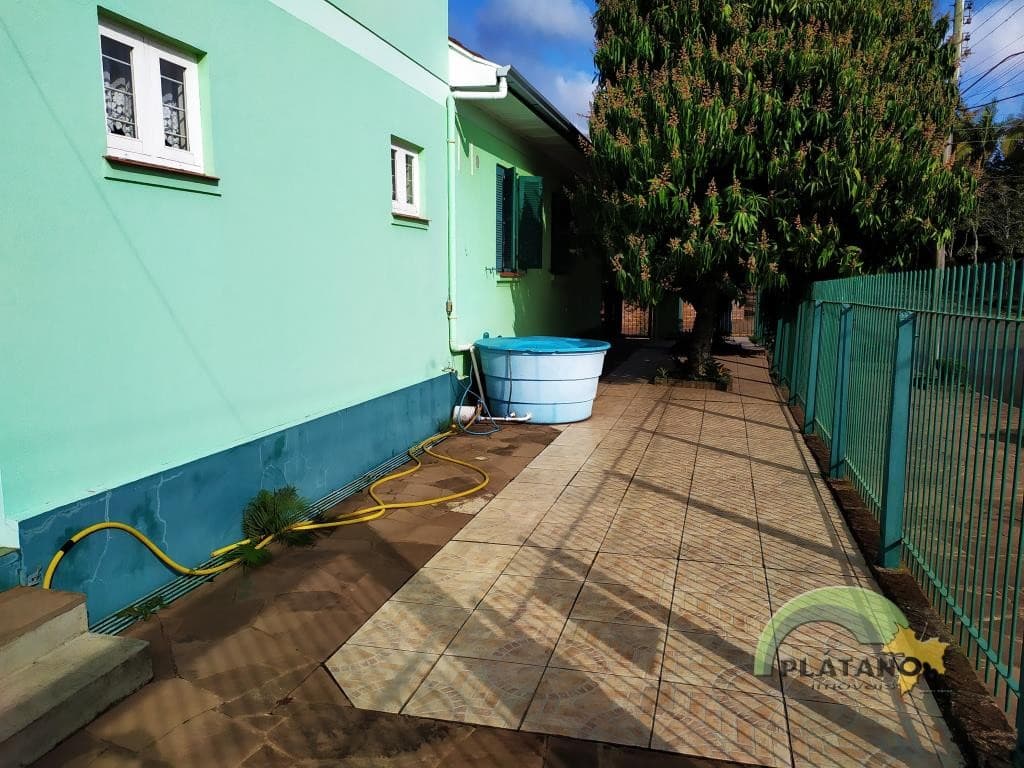 CASA COM 4 DORMITÓRIOS, 2 VAGAS, 213M² ÁREA PRIVATIVA para venda EM CENTRO - foto 3