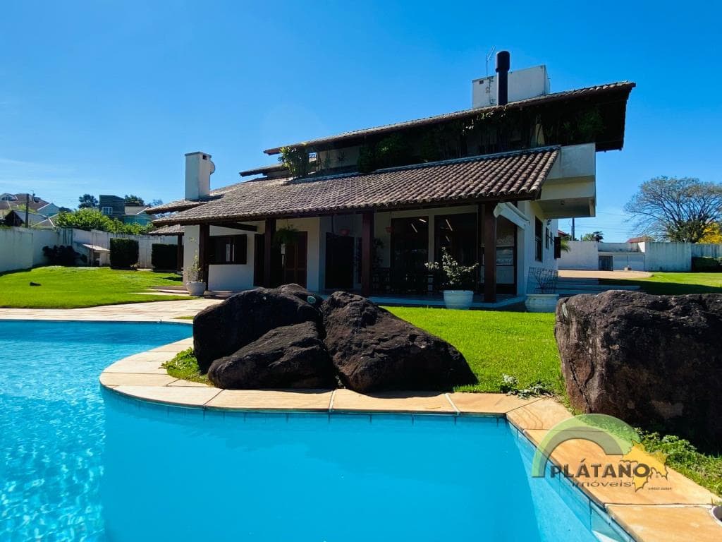 CASA COM 3 DORMITÓRIOS, 4 VAGAS, 427M² ÁREA PRIVATIVA para venda EM CIDADE NOVA - foto 2