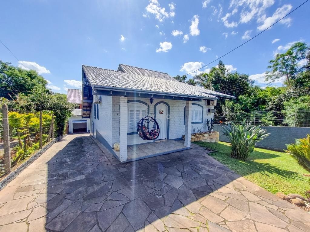 CASA COM 3 DORMITÓRIOS, 2 VAGAS, 125M² ÁREA PRIVATIVA para venda EM FARROUPILHA - foto 2