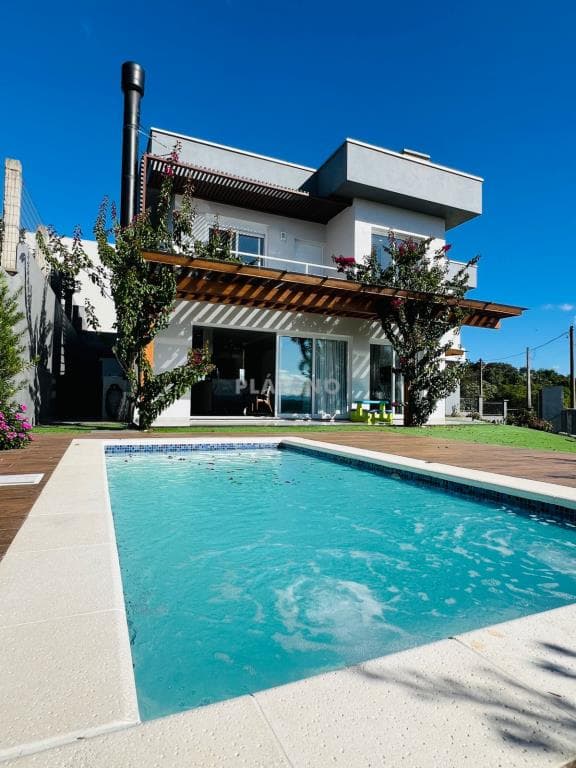 CASA COM 4 DORMITÓRIOS, 2 VAGAS, 260M² ÁREA PRIVATIVA para venda EM BOM JARDIM - foto 1