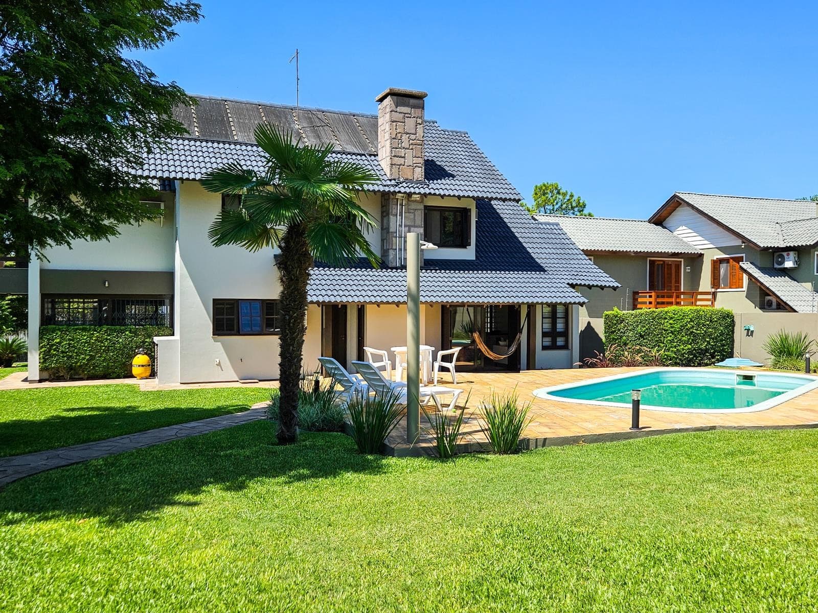 CASA COM 4 DORMITÓRIOS (1 SUÍTE), 2 VAGAS, 263M² ÁREA PRIVATIVA para venda EM CIDADE NOVA - foto 2
